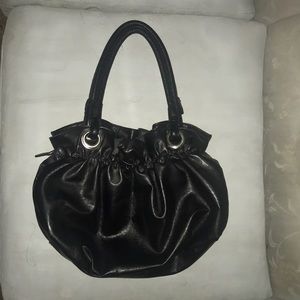 Black purse with zippered closure